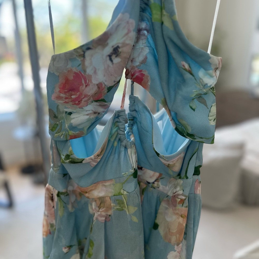 Dress from Revolve; beautiful light blue flowy dress, maxi, high in front.